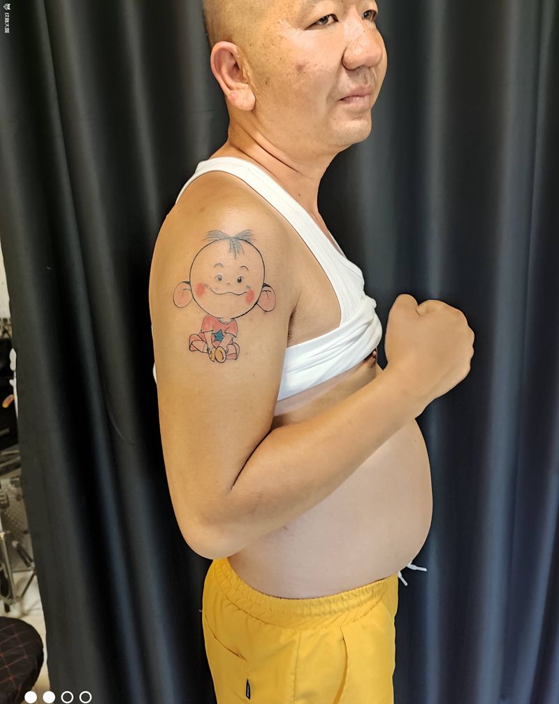 大耳朵图图纹身图片_手臂纹身图案