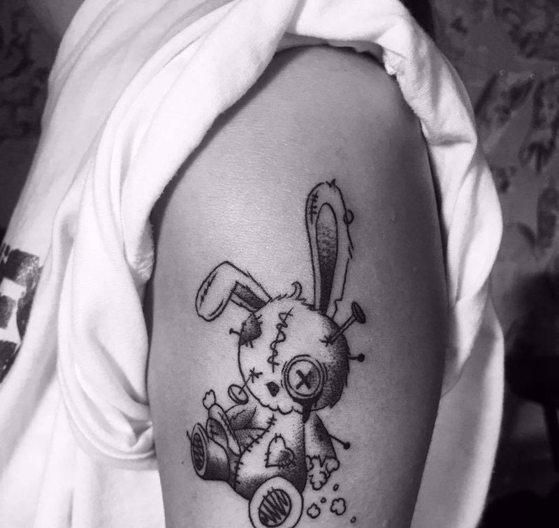 丧兔纹身图片_手臂纹身图案