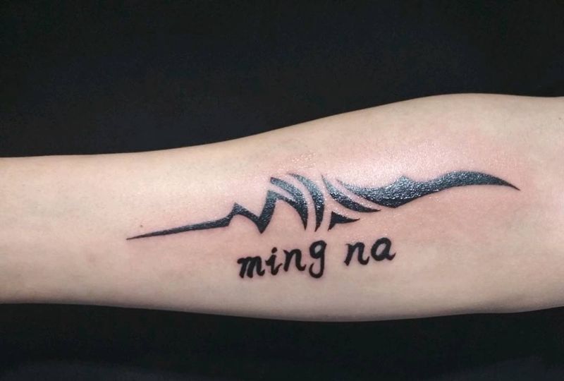 图腾纹身图片_手臂图腾点刺纹身图案