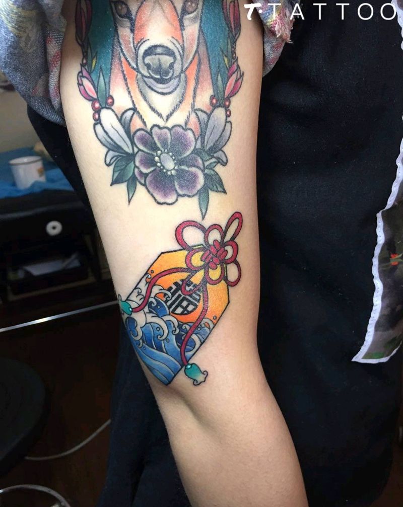 福袋纹身图片_手臂纹身图案