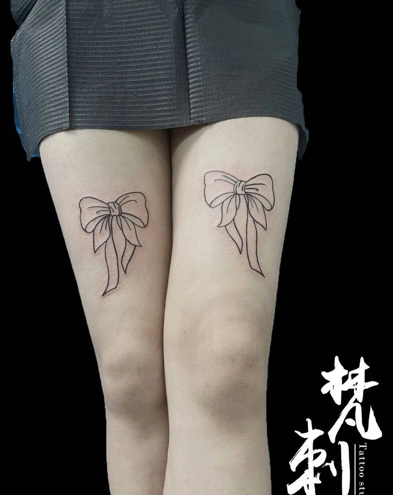 蝴蝶结一对纹身图片_腿部纹身图案