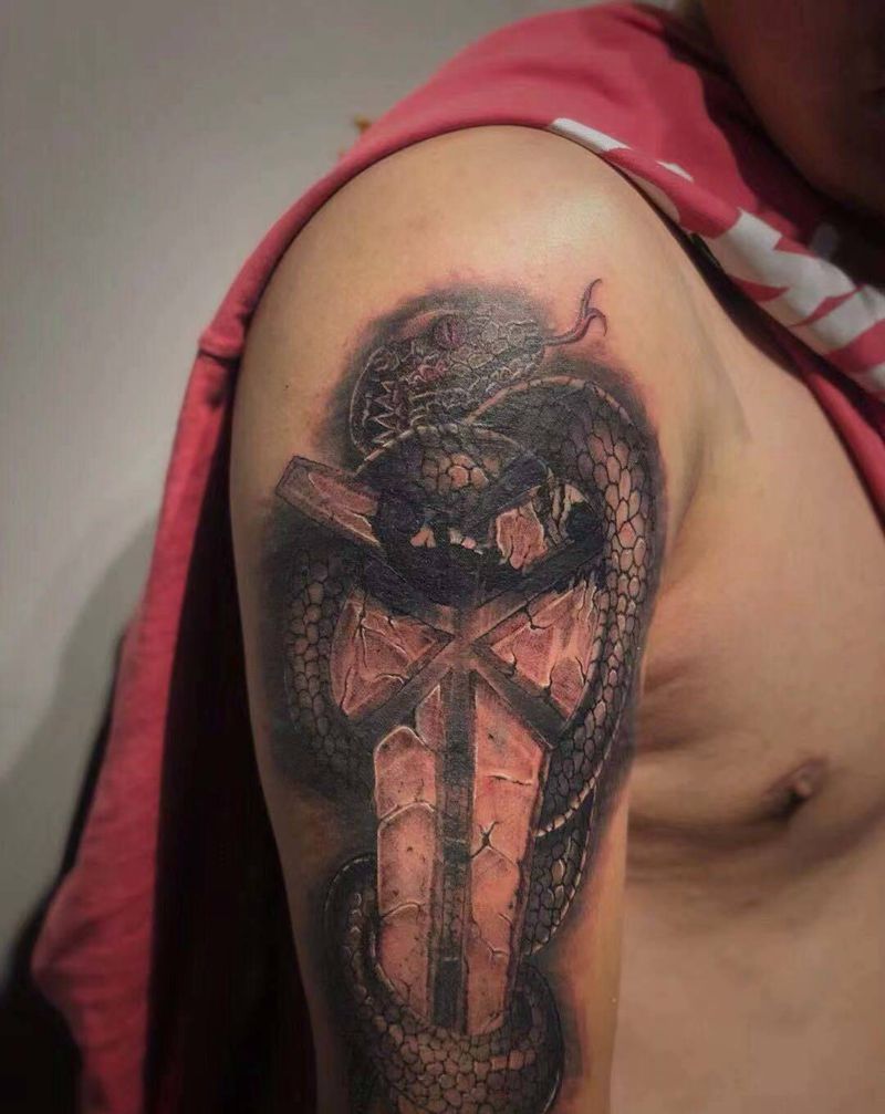 曼巴蛇遮盖纹身图片_手臂欧美写实纹身图案