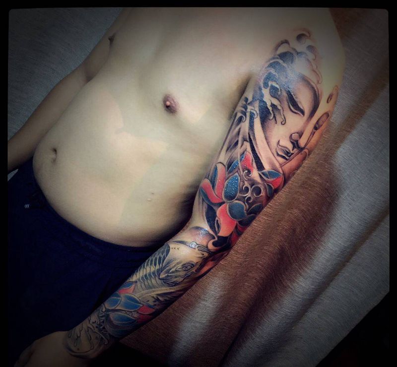 早期传统作品（佛鱼纹身图片_手臂新传统纹身图案