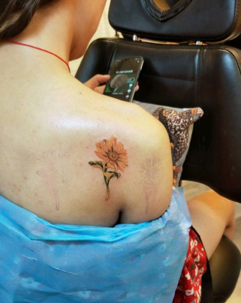 葵花纹身图片_背部欧美写实纹身图案