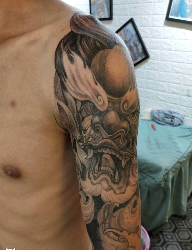 遮盖的。唐狮纹身图片_手部新传统纹身图案