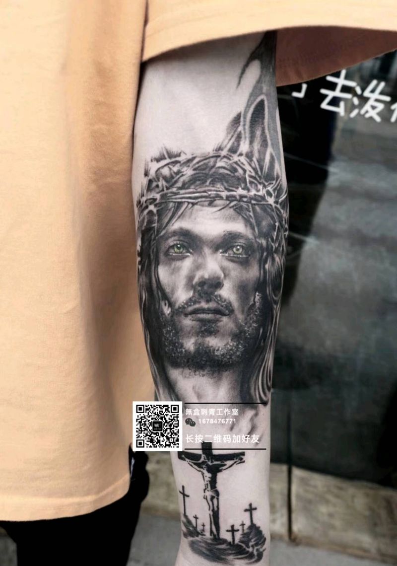 耶稣纹身图片_手部手臂欧美写实纹身图案
