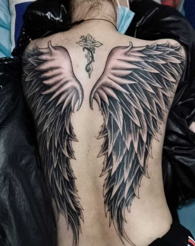 原创背羽纹身图片_背部纹身图案