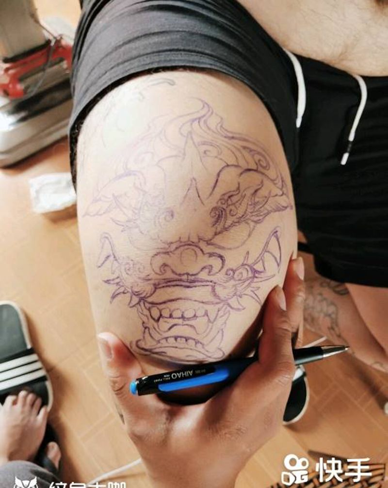 狮头纹身图片_脚部新传统老传统纹身图案