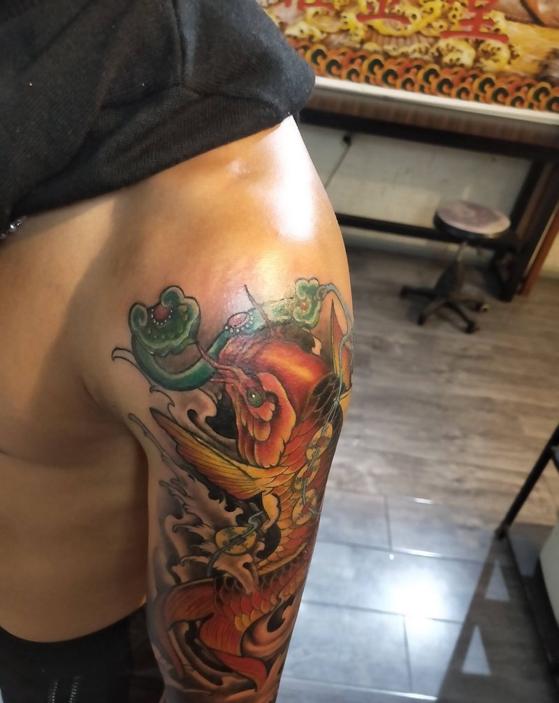 鱼纹身图片_手臂纹身图案