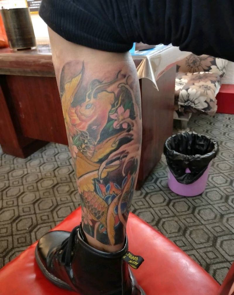 鱼纹身图片_腿部新传统纹身图案