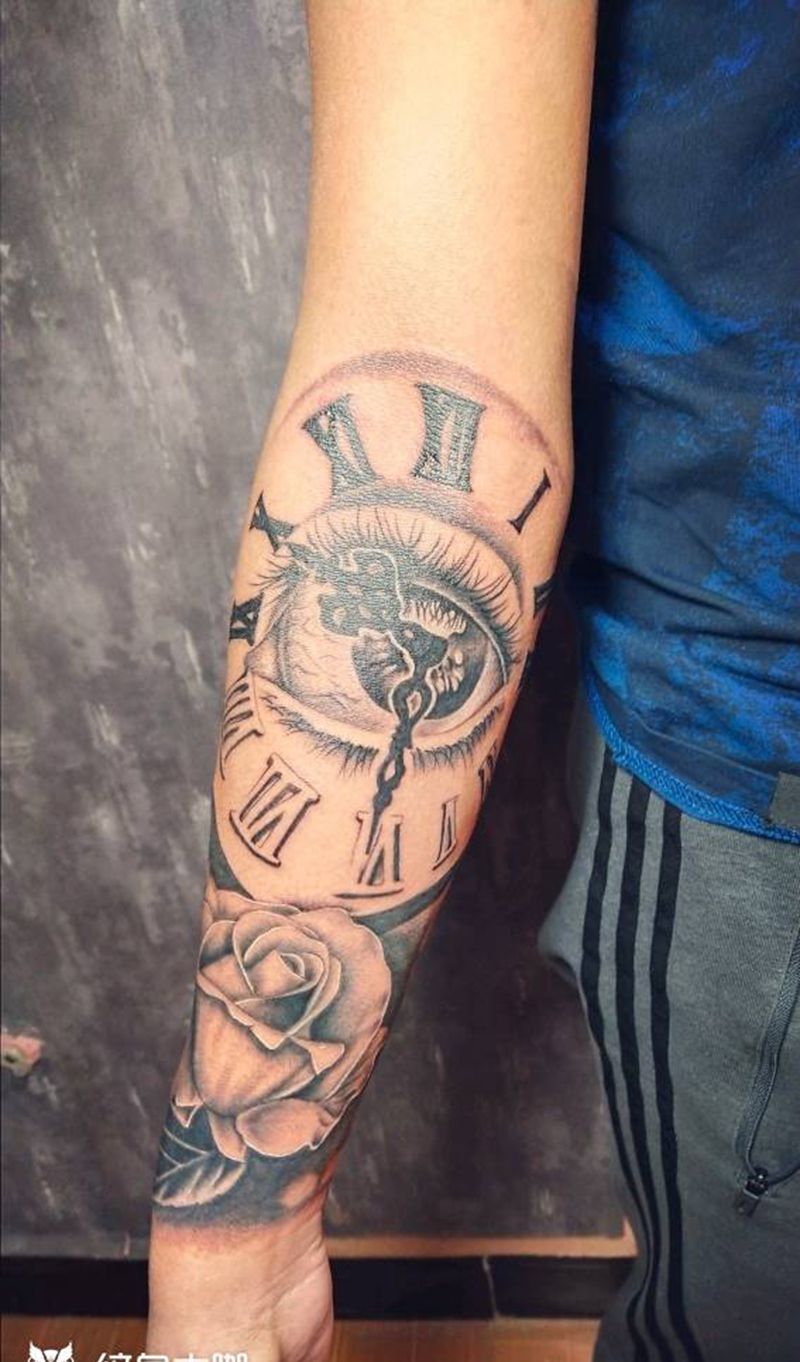 写实玫瑰上帝之眼纹身图片_手臂欧美写实纹身图案