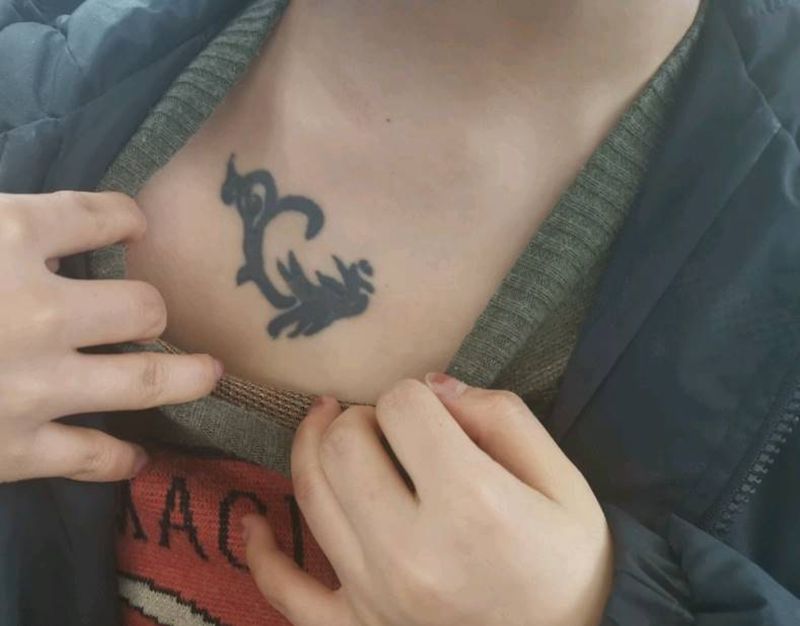 鲸鱼遮盖纹身图片