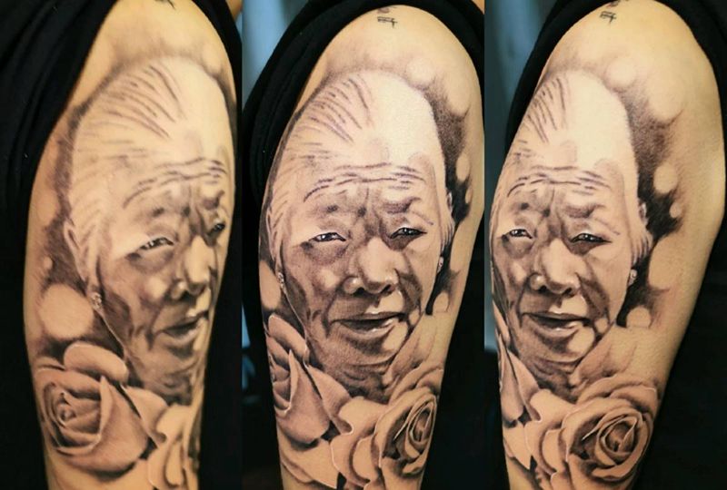 肖像纹身图片_手臂欧美写实肖像玫瑰纹身图案