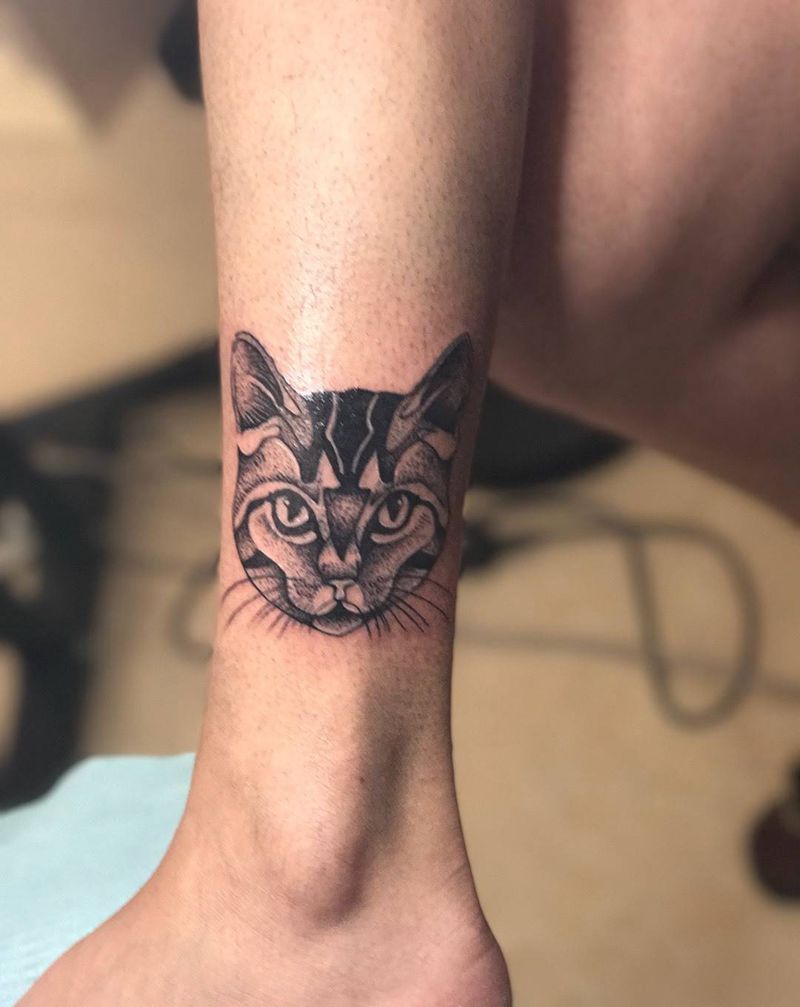 点刺猫纹身图片_成品腿部欧美动物纹身图案