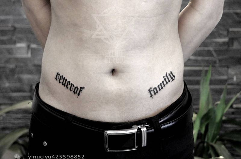 哥特纹身图片_成品腰部艺奴刺域字母纹身图案