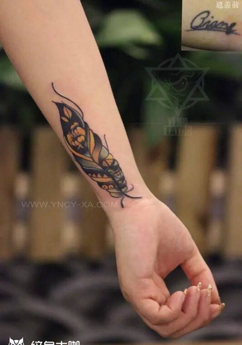 羽毛遮盖纹身图片_成品手臂清新艺奴刺域纹身图案
