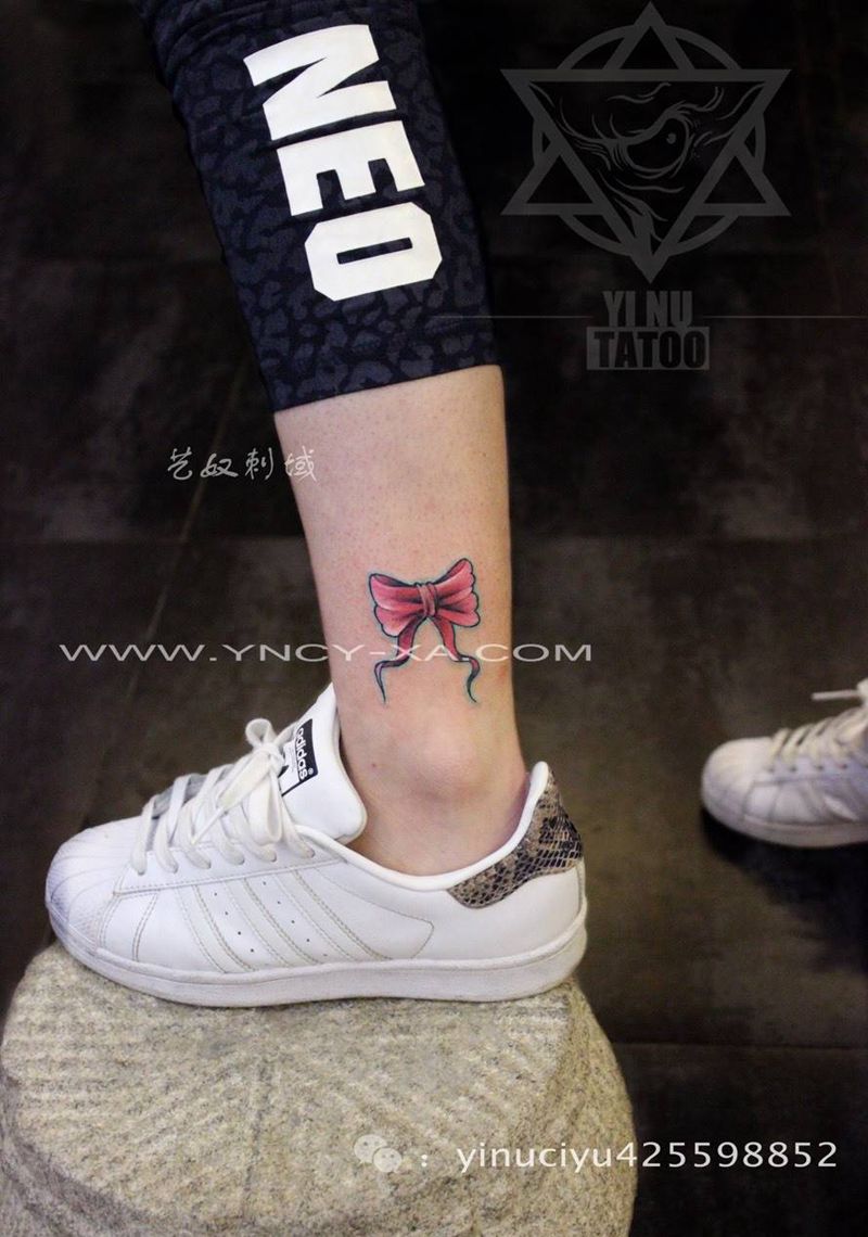 蝴蝶结纹身图片_成品腿部清新原创艺奴刺域纹身图案