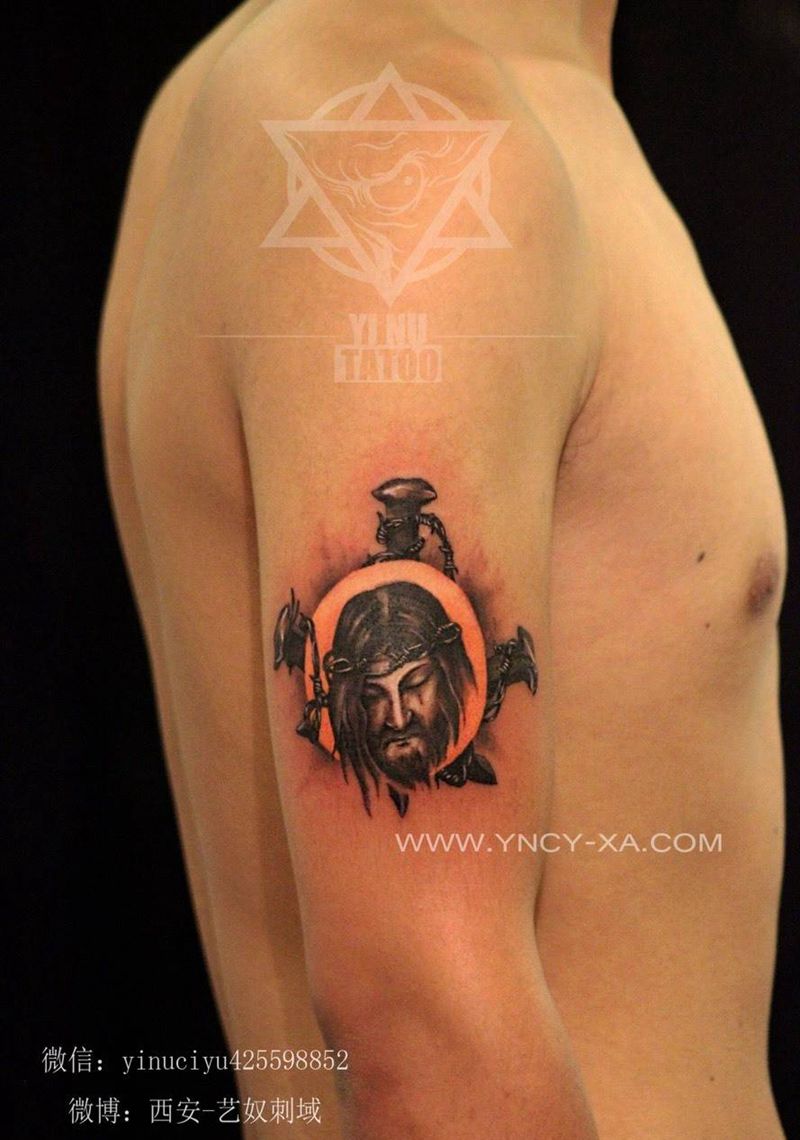 耶稣十字架纹身图片_成品手臂欧美人物艺奴刺域纹身图案