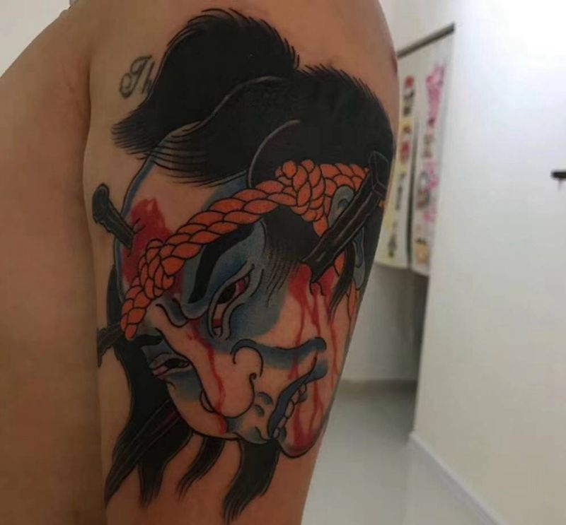 生首纹身图片_手臂老传统人物纹身图案