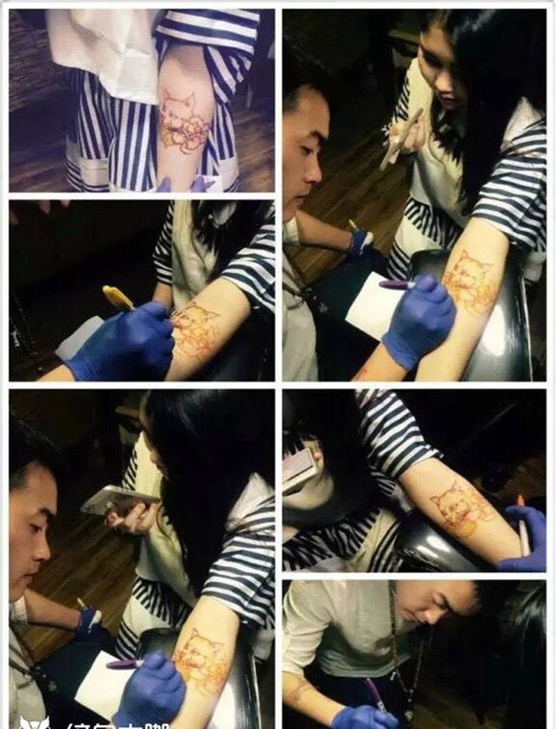 原创线面喵咪纹身图片_成品手臂清新艺奴刺域纹身图案