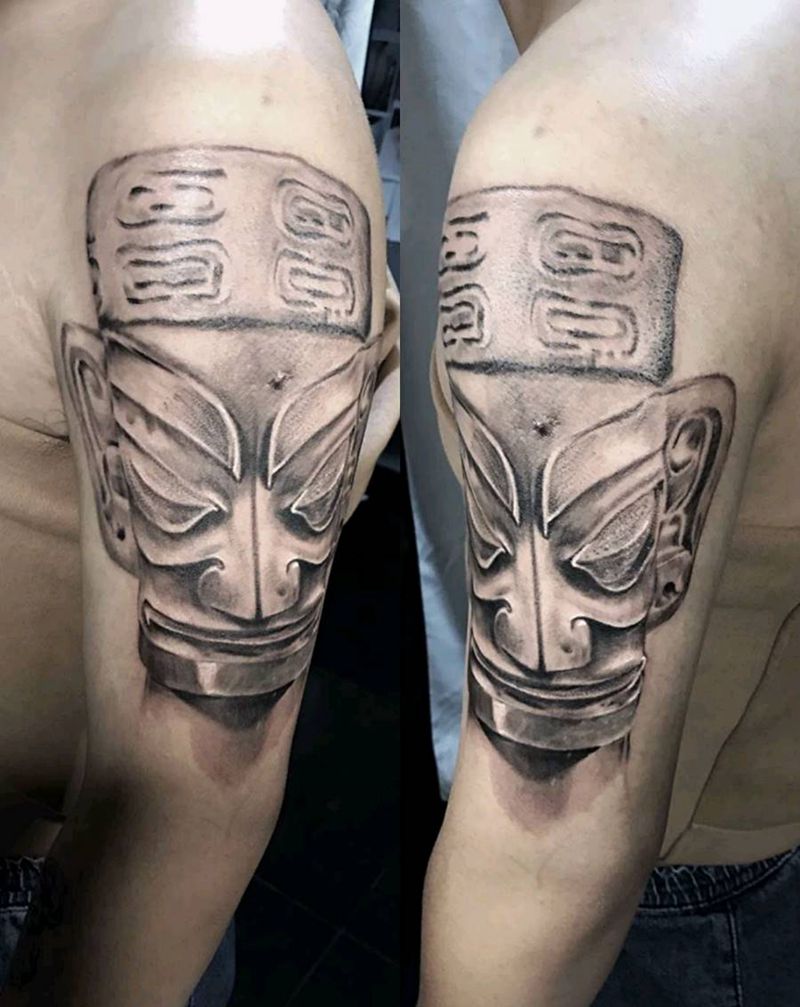 三星堆青铜人像纹身图片_手臂欧美写实纹身图案