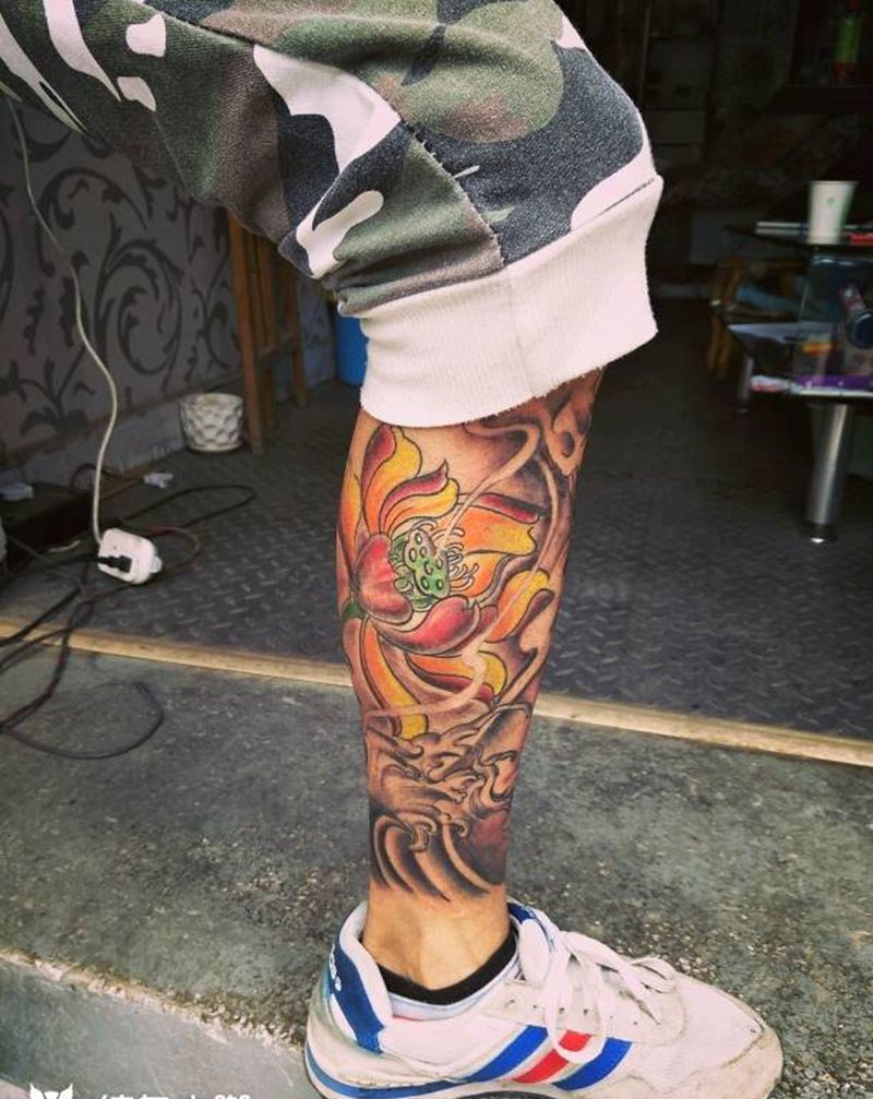 唐狮包小腿纹身图片