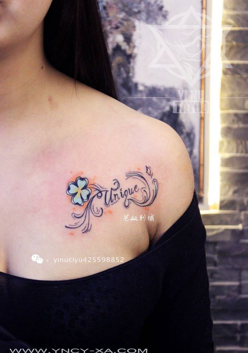 四叶草纹身图片_成品胸部清新艺奴刺域植物纹身图案