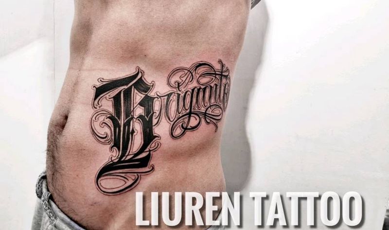 花体字-土匪纹身图片_腹部纹身图案