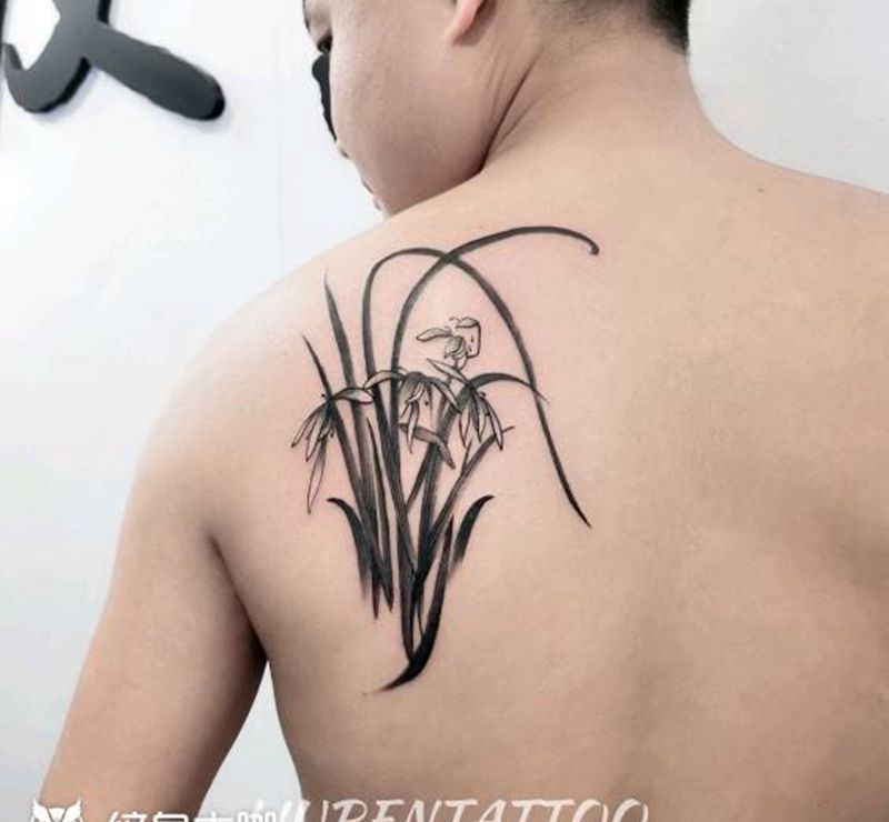 兰花纹身图片_水墨纹身图案