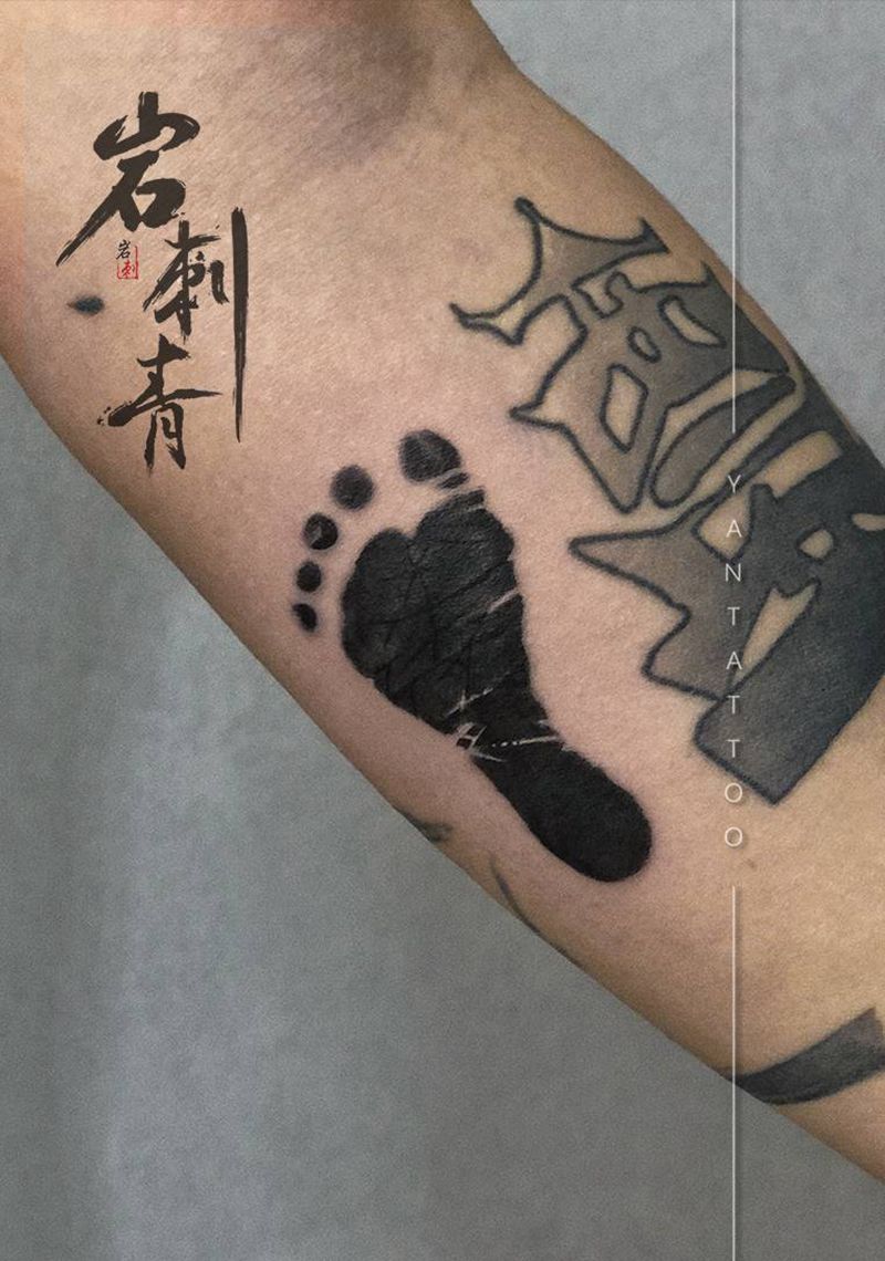 脚印纹身图片_手臂图腾纹身图案