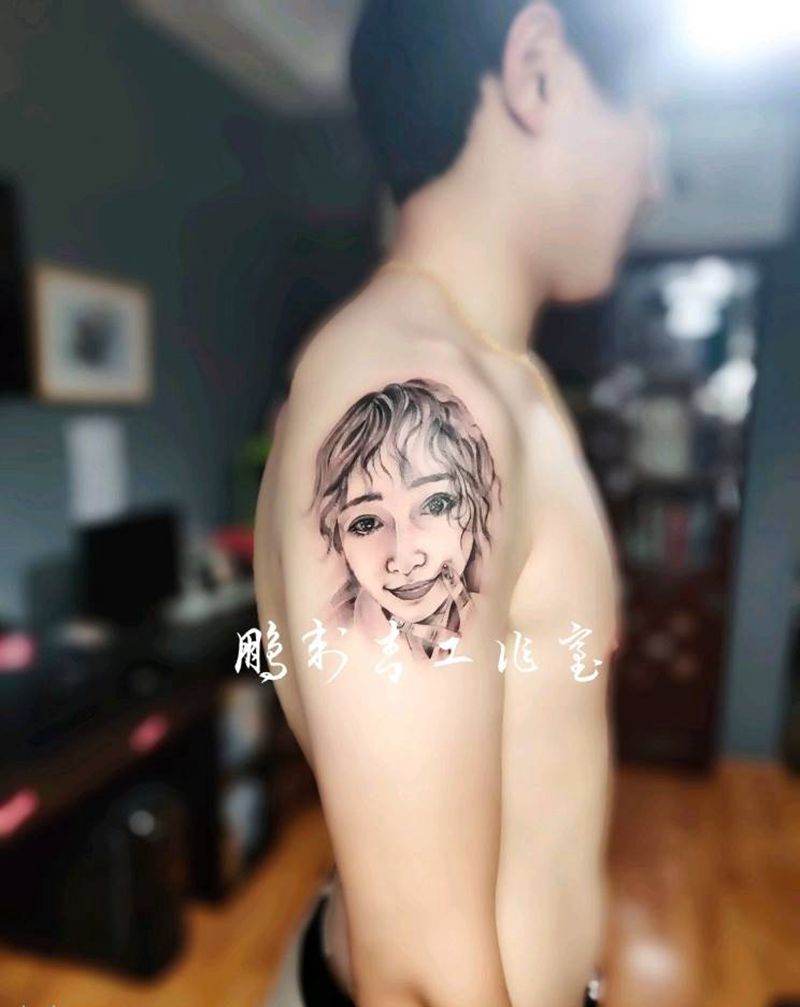 肖像纹身图片_手臂纹身图案