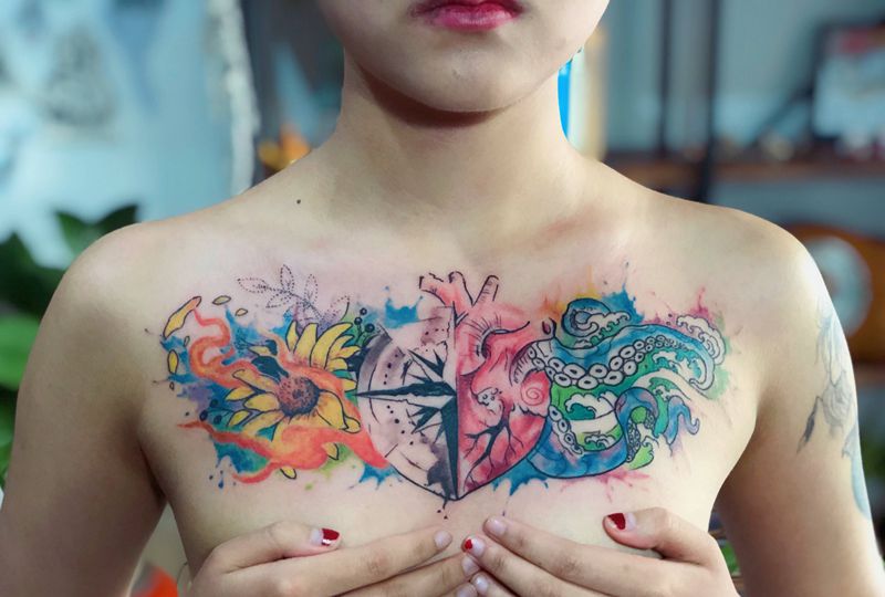 陆地海洋纹身图片_胸部水墨水彩纹身图案