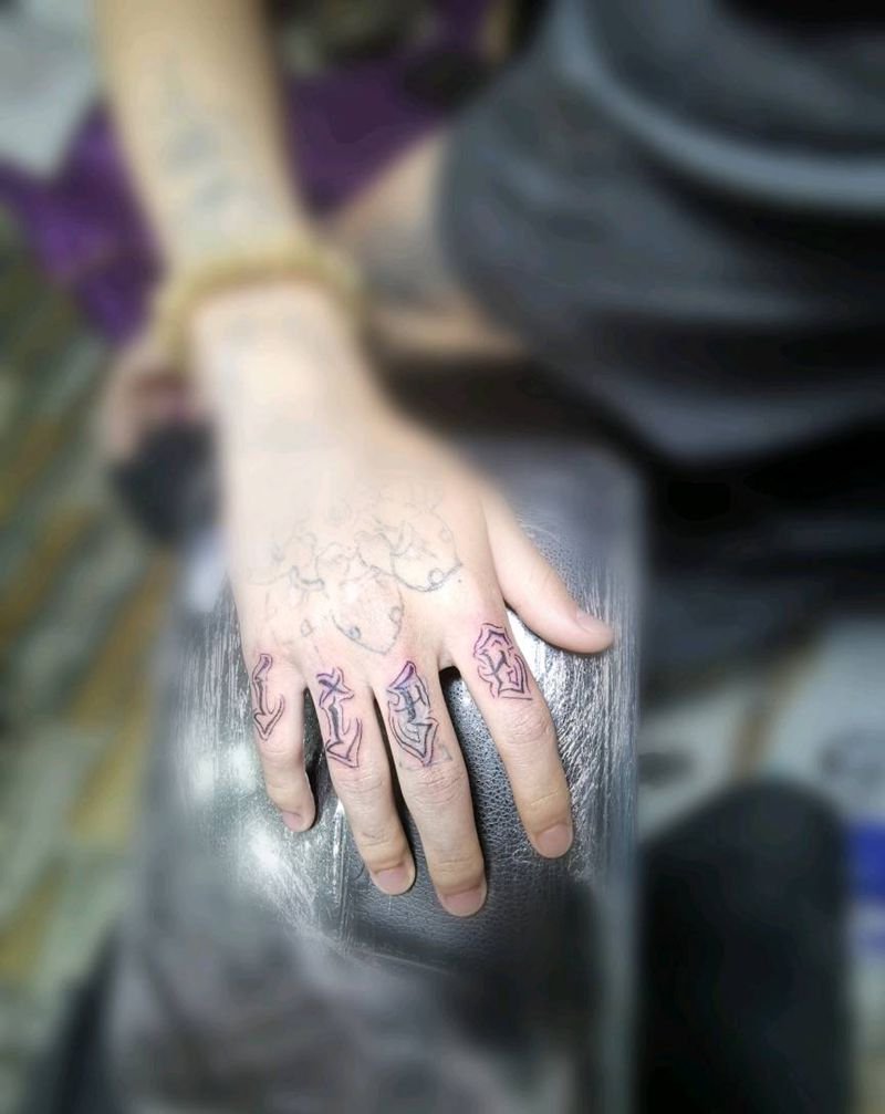 字母纹身图片_手部纹身图案