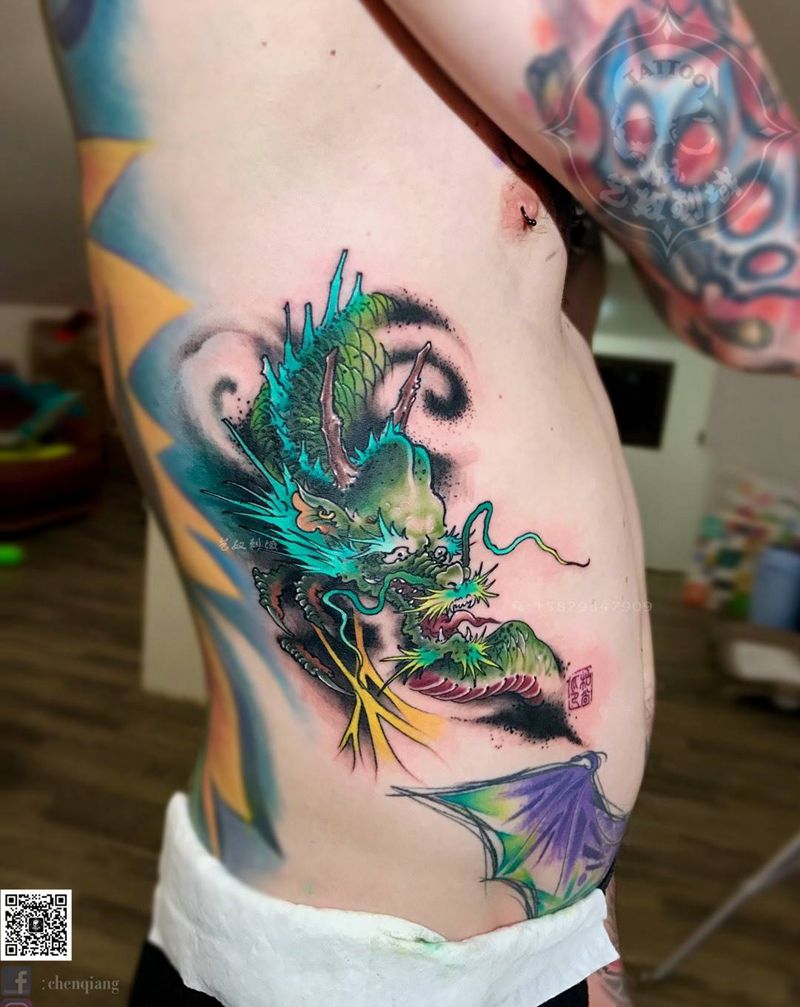 原创新传统龙纹身图片_腹部腰部新传统龙艺奴刺域纹身图案