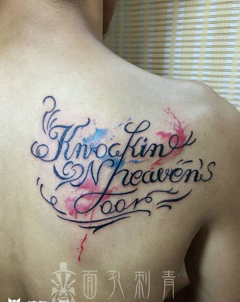 花体英文字母纹身纹身图片_背部习俗字符成品纹身图案