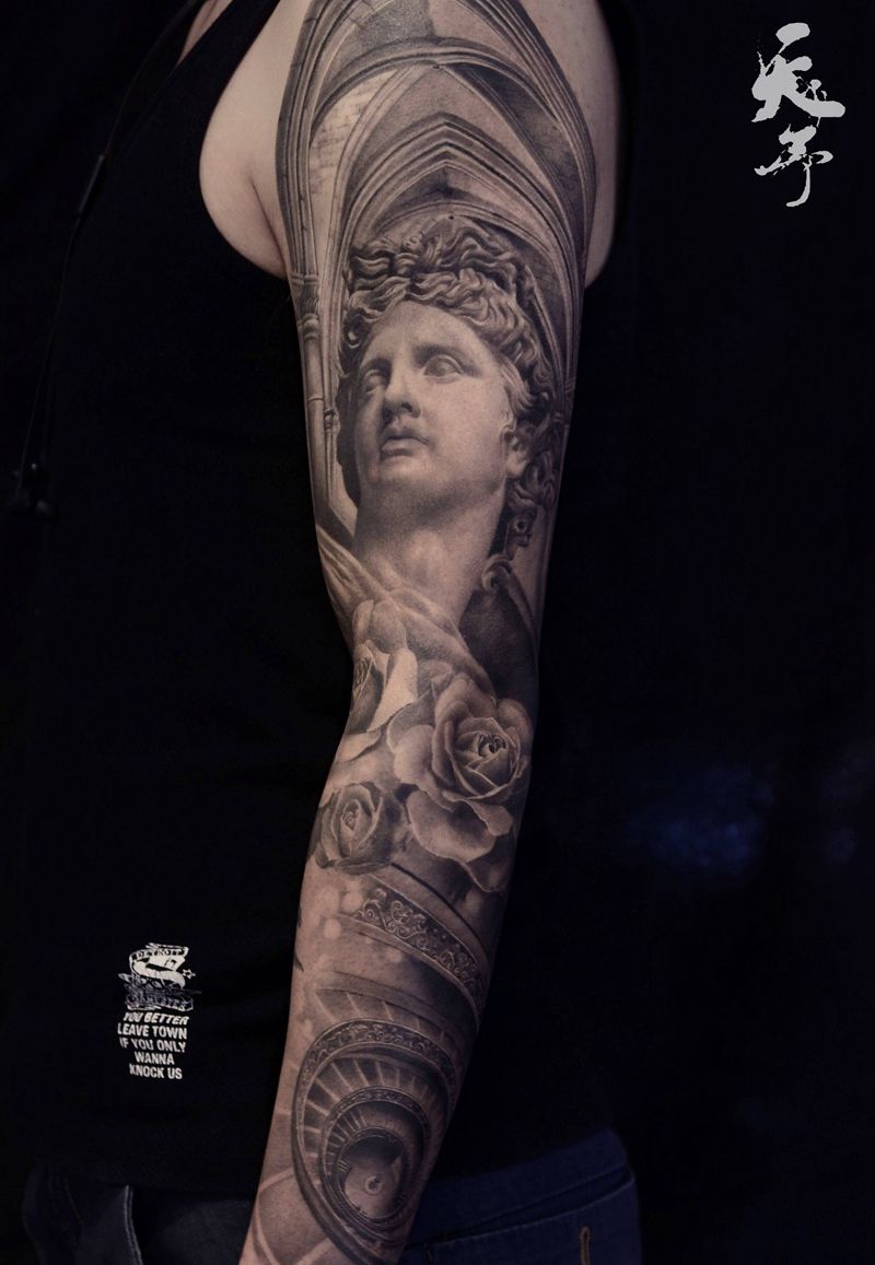 西安天予刺青写实作品纹身图片_手臂欧美写实火枪眼睛雕塑纹身图案