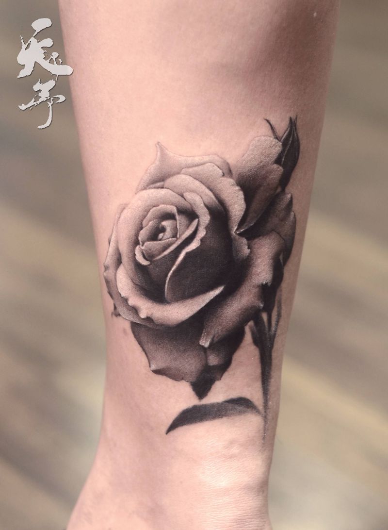 西安天予刺青写实作品纹身图片_脚部欧美写实玫瑰纹身图案