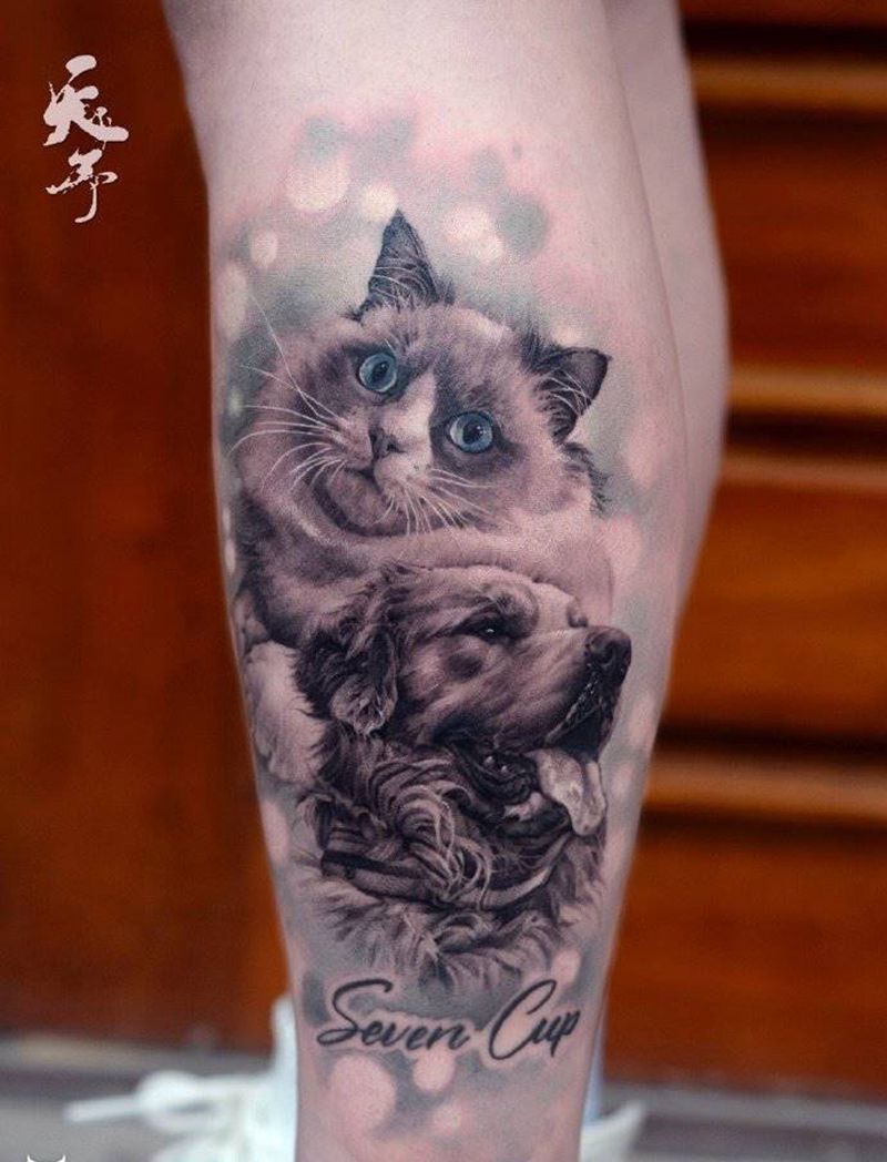 西安天予刺青写实作品纹身图片_腿部欧美写实猫 狗纹身图案