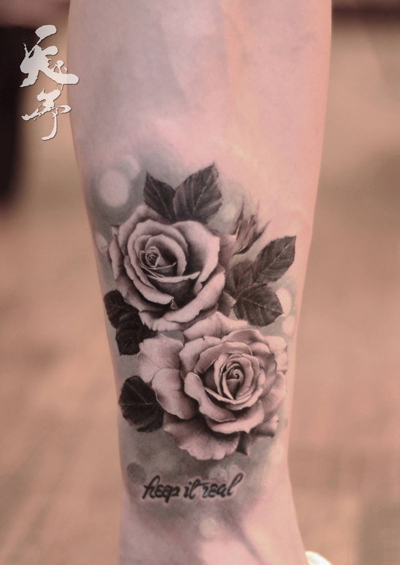 西安天予刺青写实作品纹身图片_腿部欧美写实玫瑰纹身图案