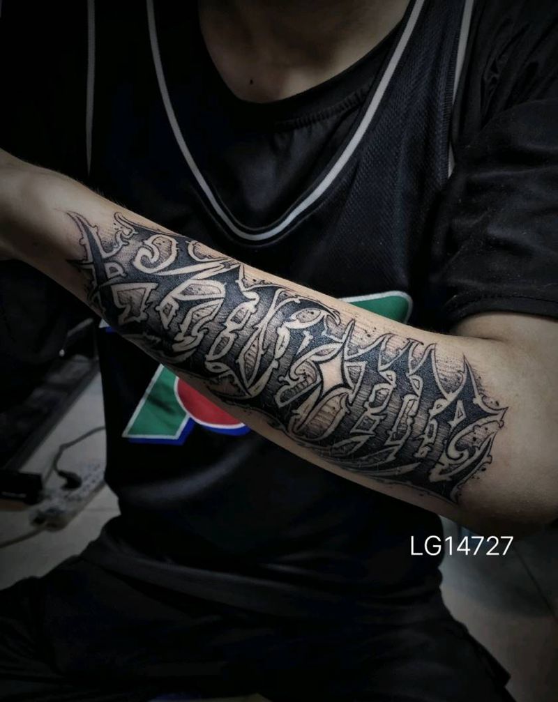 花体字纹身图片_手臂纹身图案