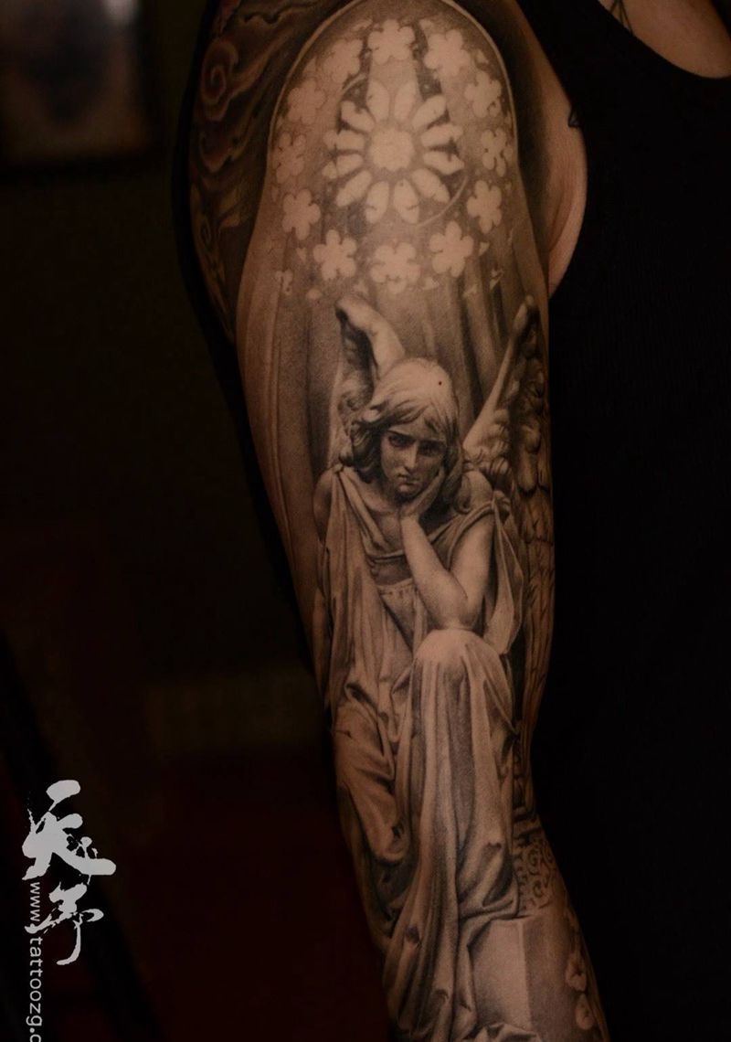 西安天予刺青素描作品纹身图片_成品手臂欧美写实肖像人物西安黑灰纹身图案