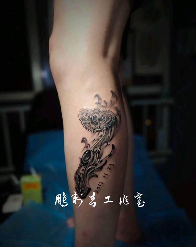 如意纹身图片_腿部新传统纹身图案