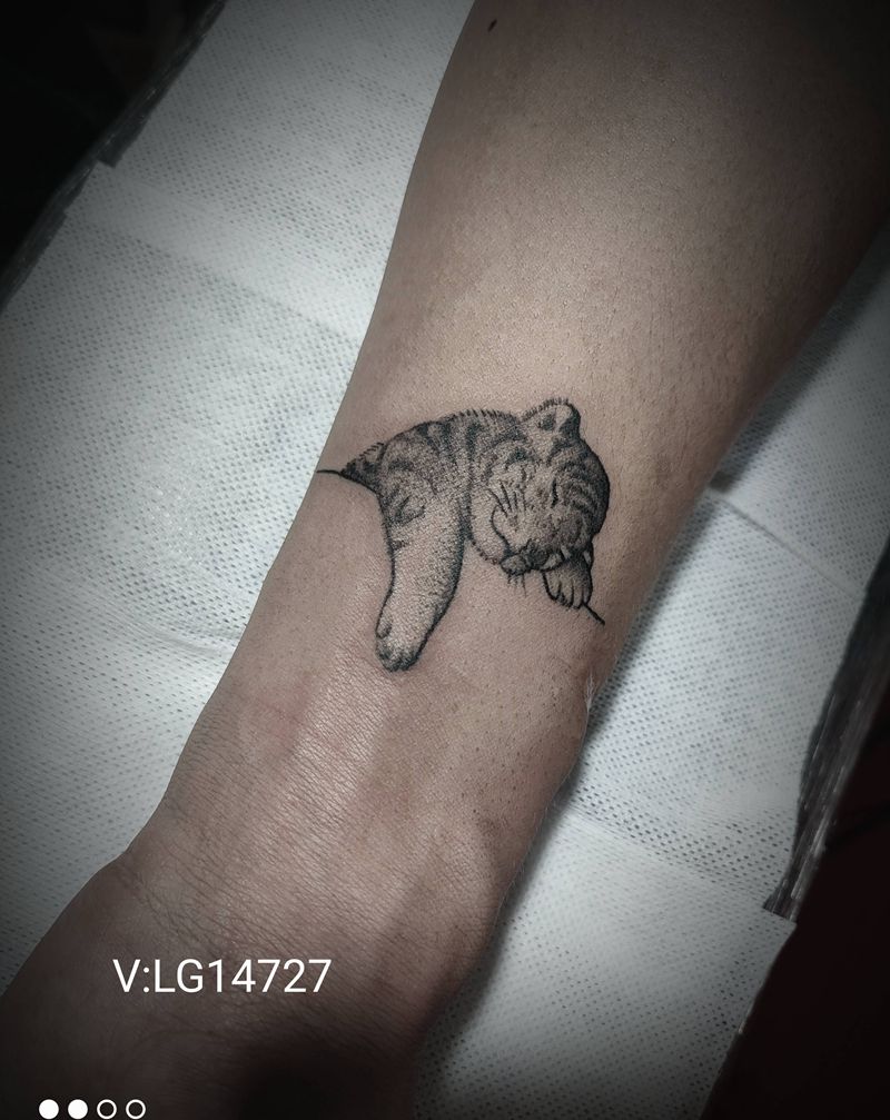 小脑斧纹身图片_手臂纹身图案