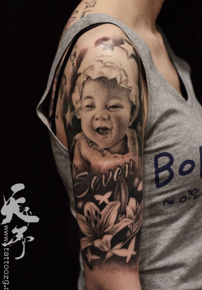 西安天予刺青写实作品纹身图片_成品手臂肩部欧美肖像写实人物原创西安黑灰纹身图案