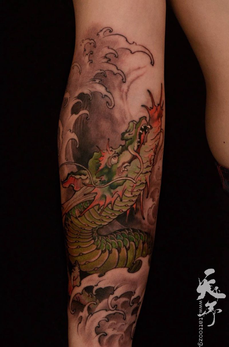西安天予刺青传统作品纹身图片_成品手臂手部传统鬼神原创西安彩色黑灰龙纹身图案
