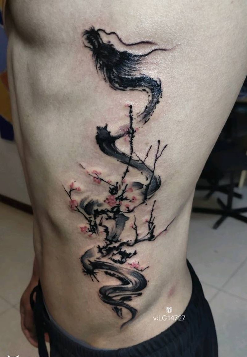 水墨纹身图片_腹部纹身图案