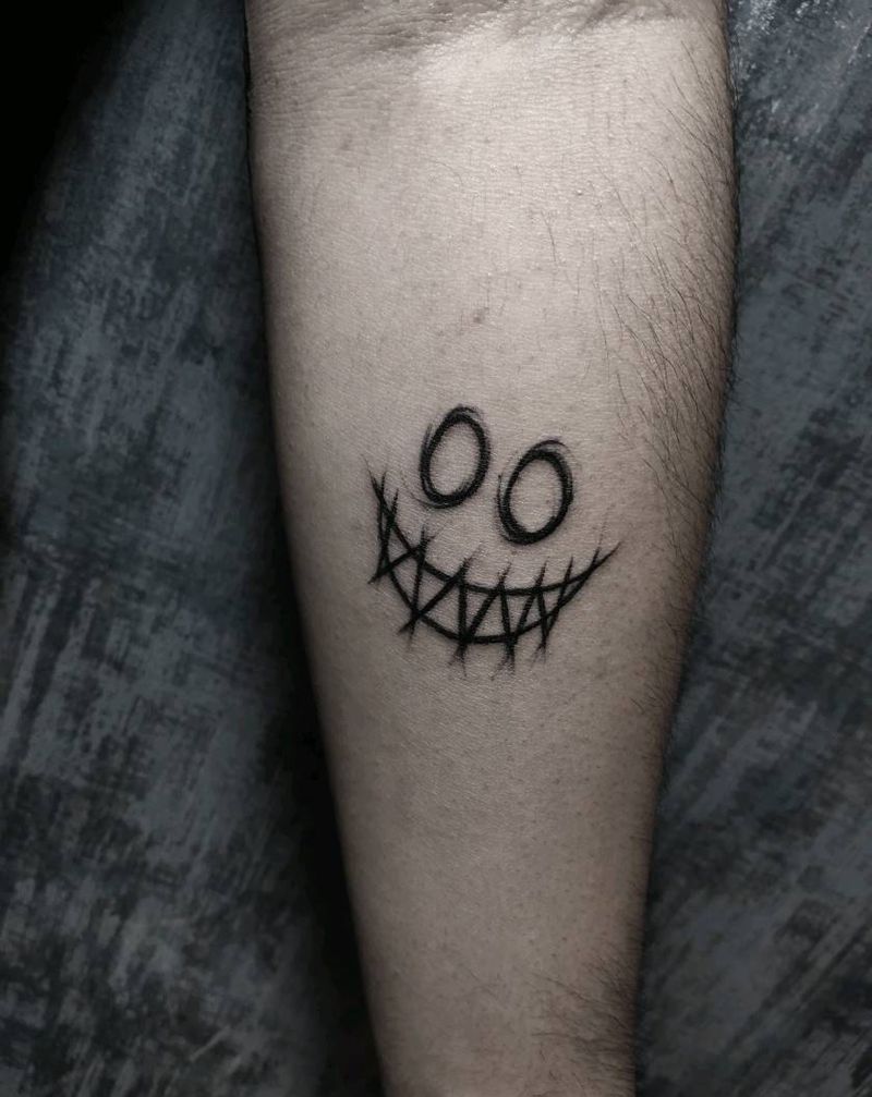 笑脸纹身图片_手臂纹身图案