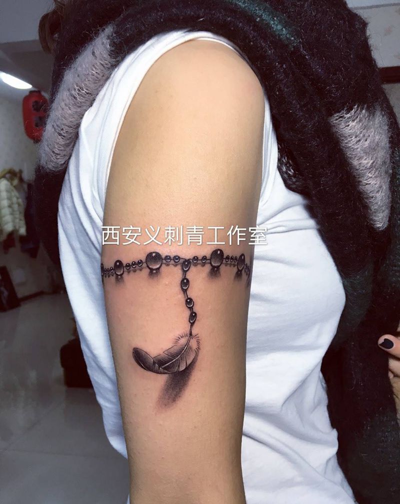 3d手链羽毛纹身图片_原创写实清新手臂成品纹身图案