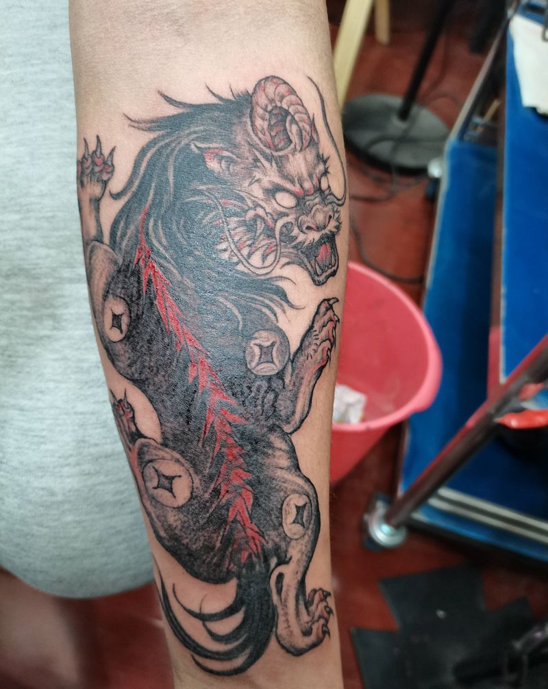 貔貅纹身图片_手臂纹身图案