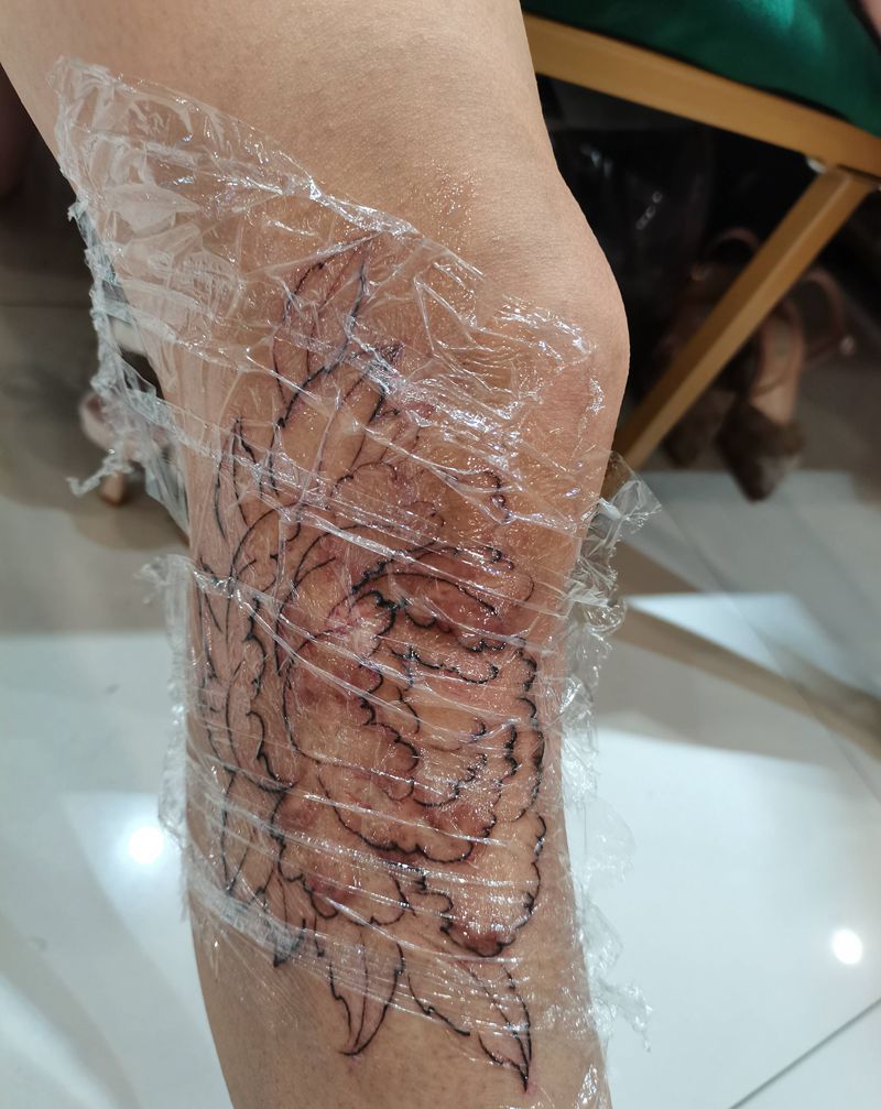 牡丹纹身图片_腿部纹身图案